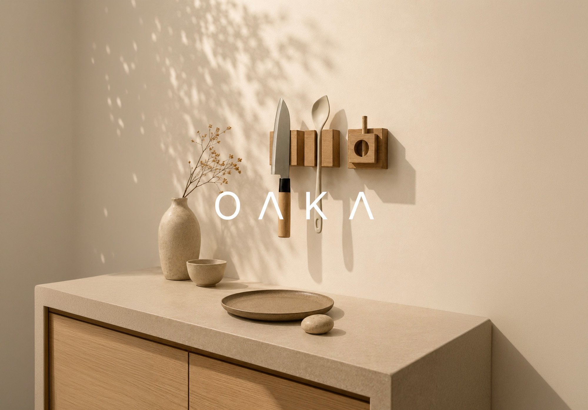 OAKA studio — bone-walled interior with a single sculptural object